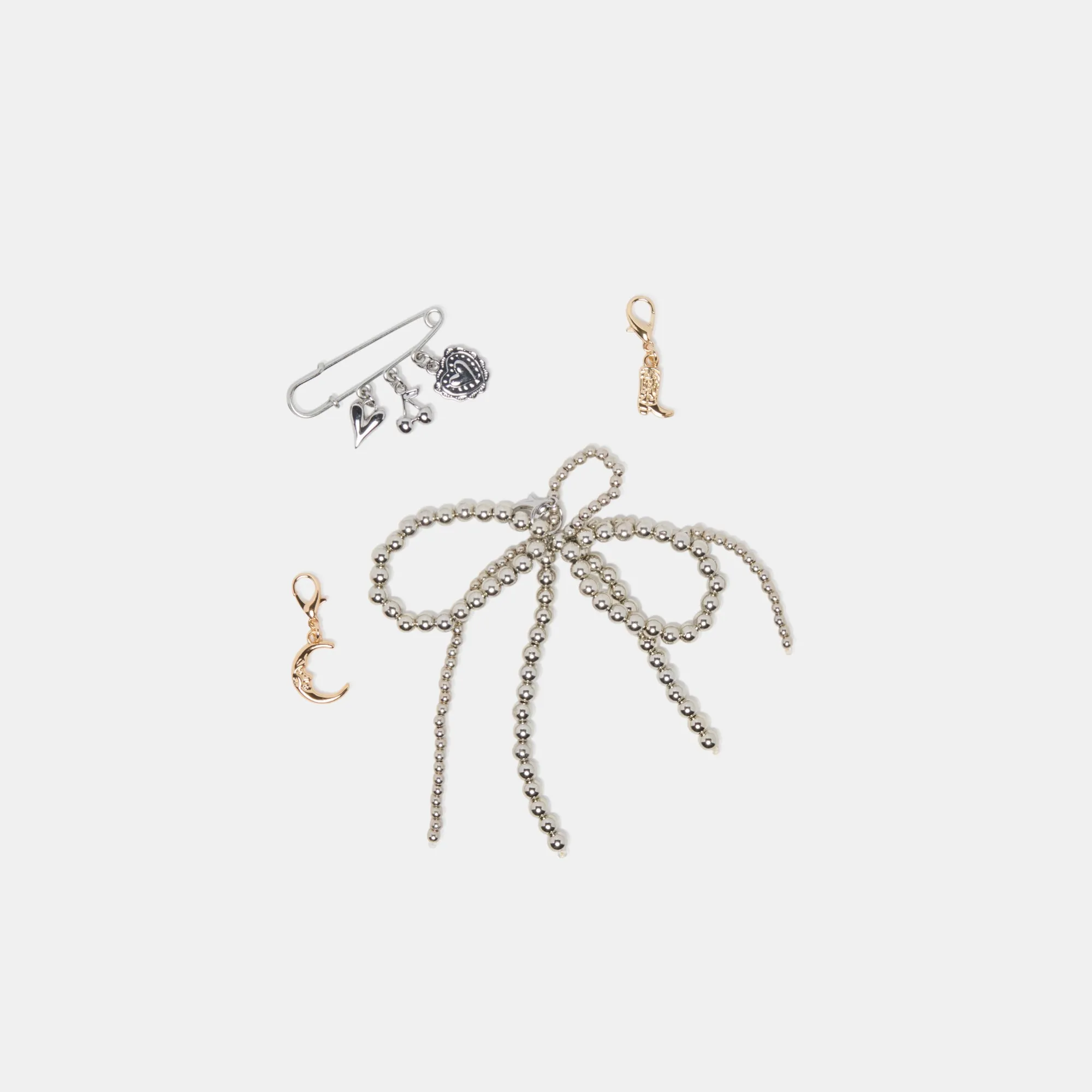DELANY SNEAKERS OR CLAIR   CHARM PIN EN LOT