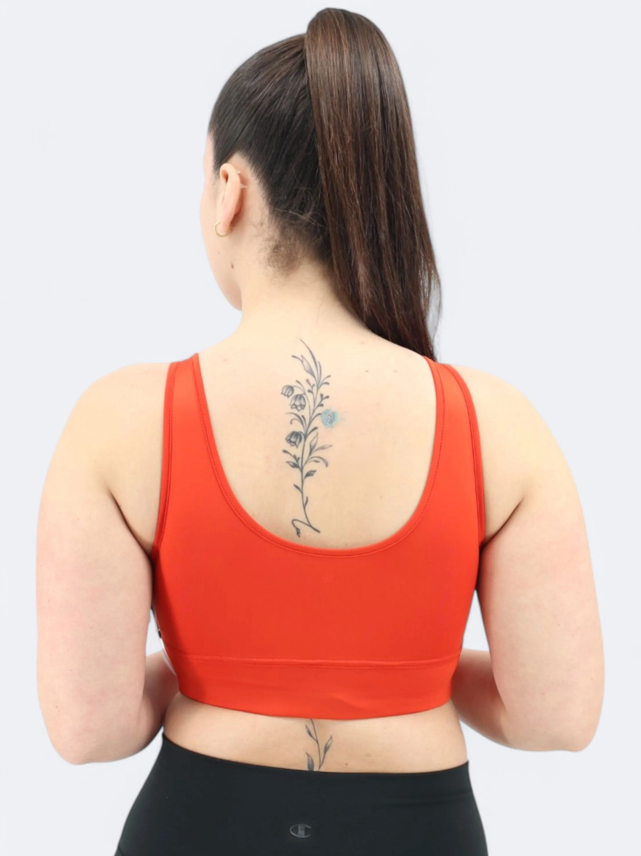 Haut de sport féminin uni coupé, orange brûlé